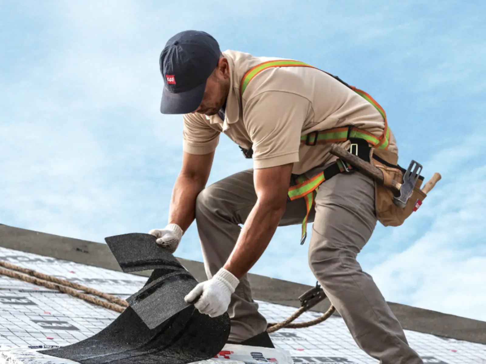 a man working on a roof