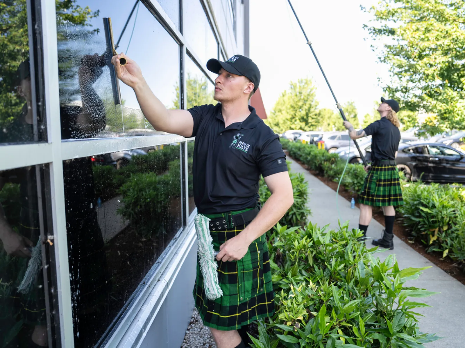 a person in a kilt holding a gun