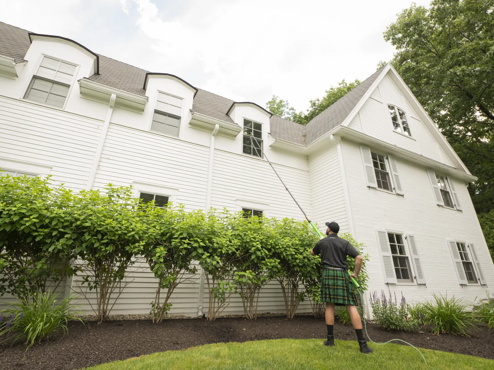 a person standing in front of a house