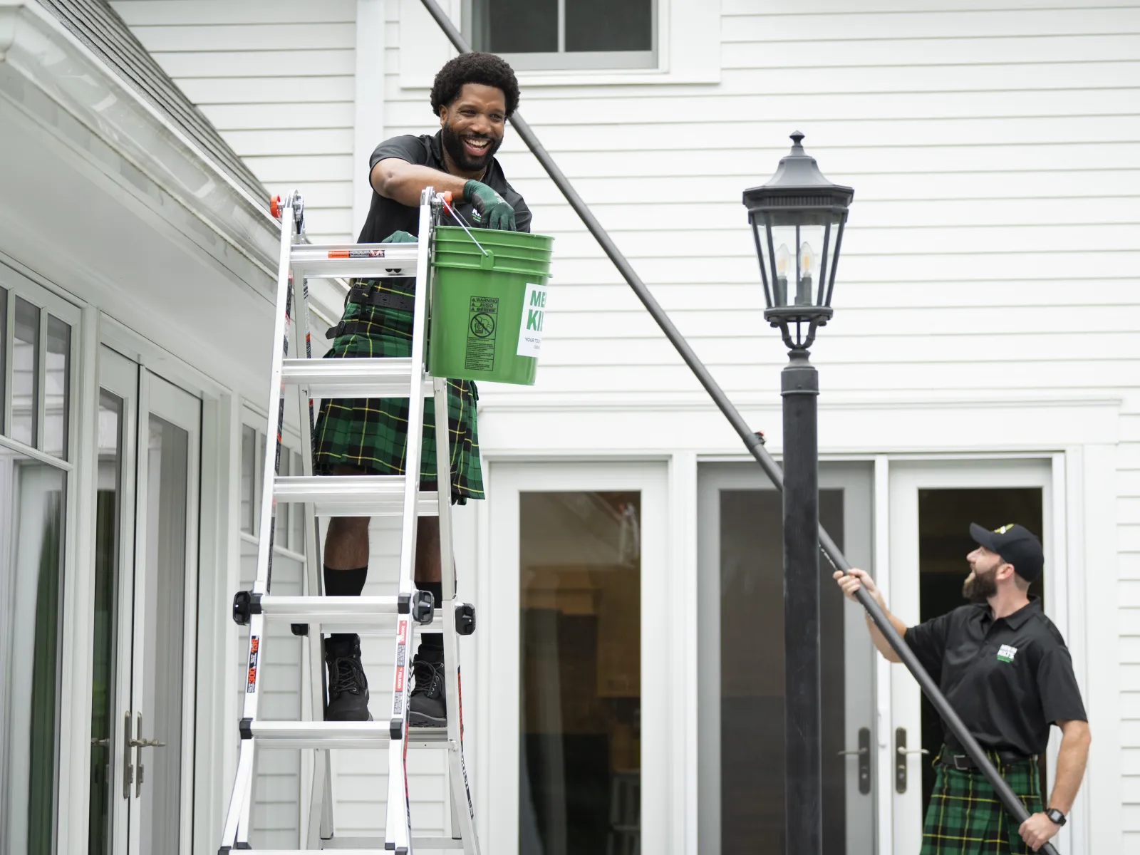 Alan Branch et al. on a ladder