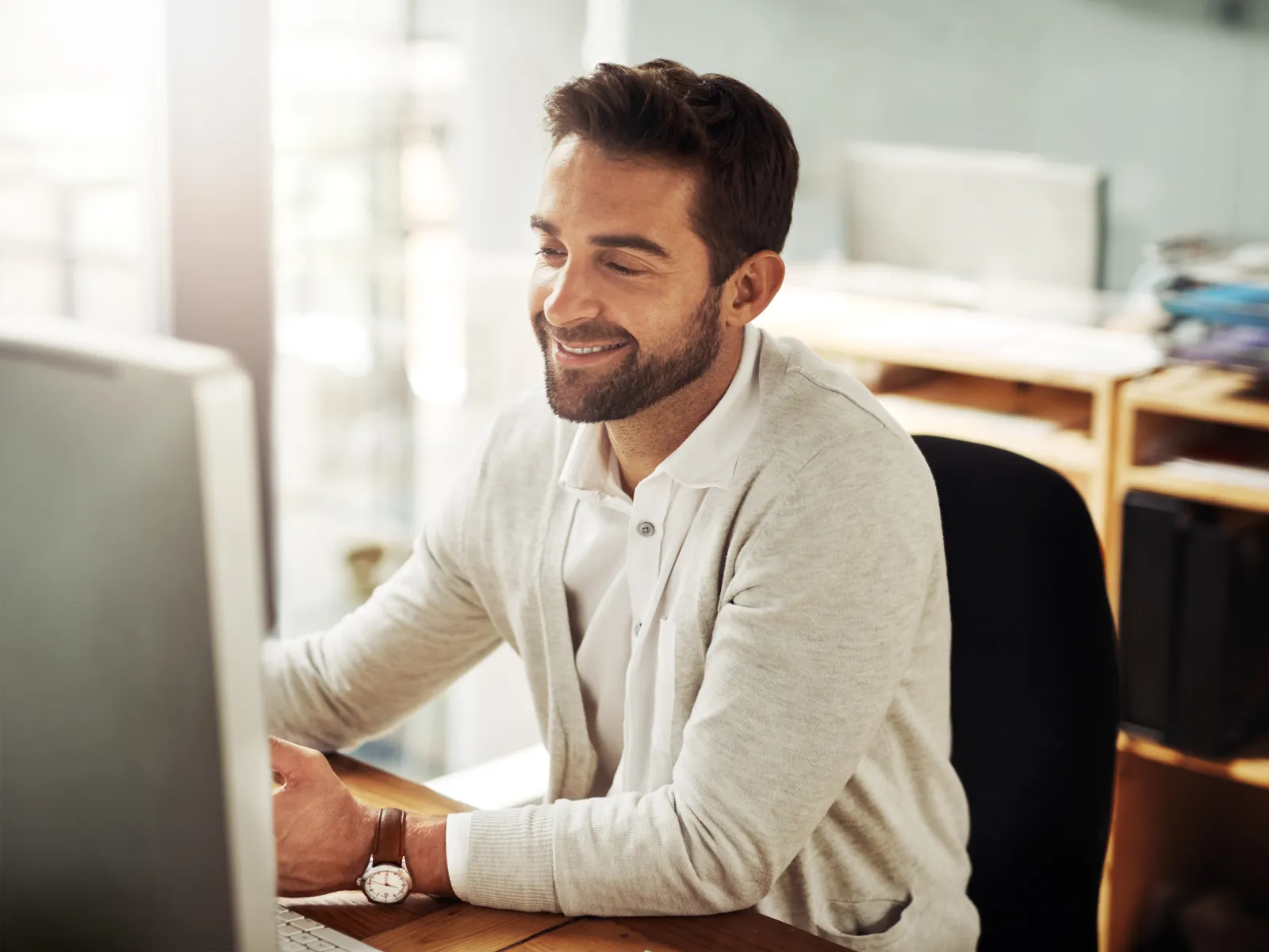 a man sitting at a desk