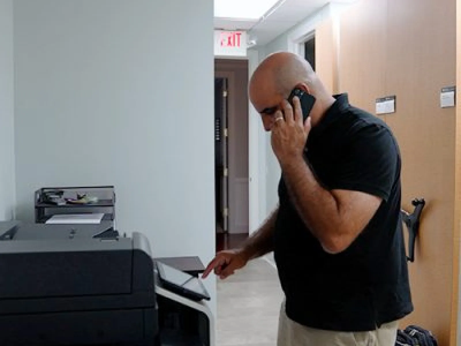 a man talking on a cell phone
