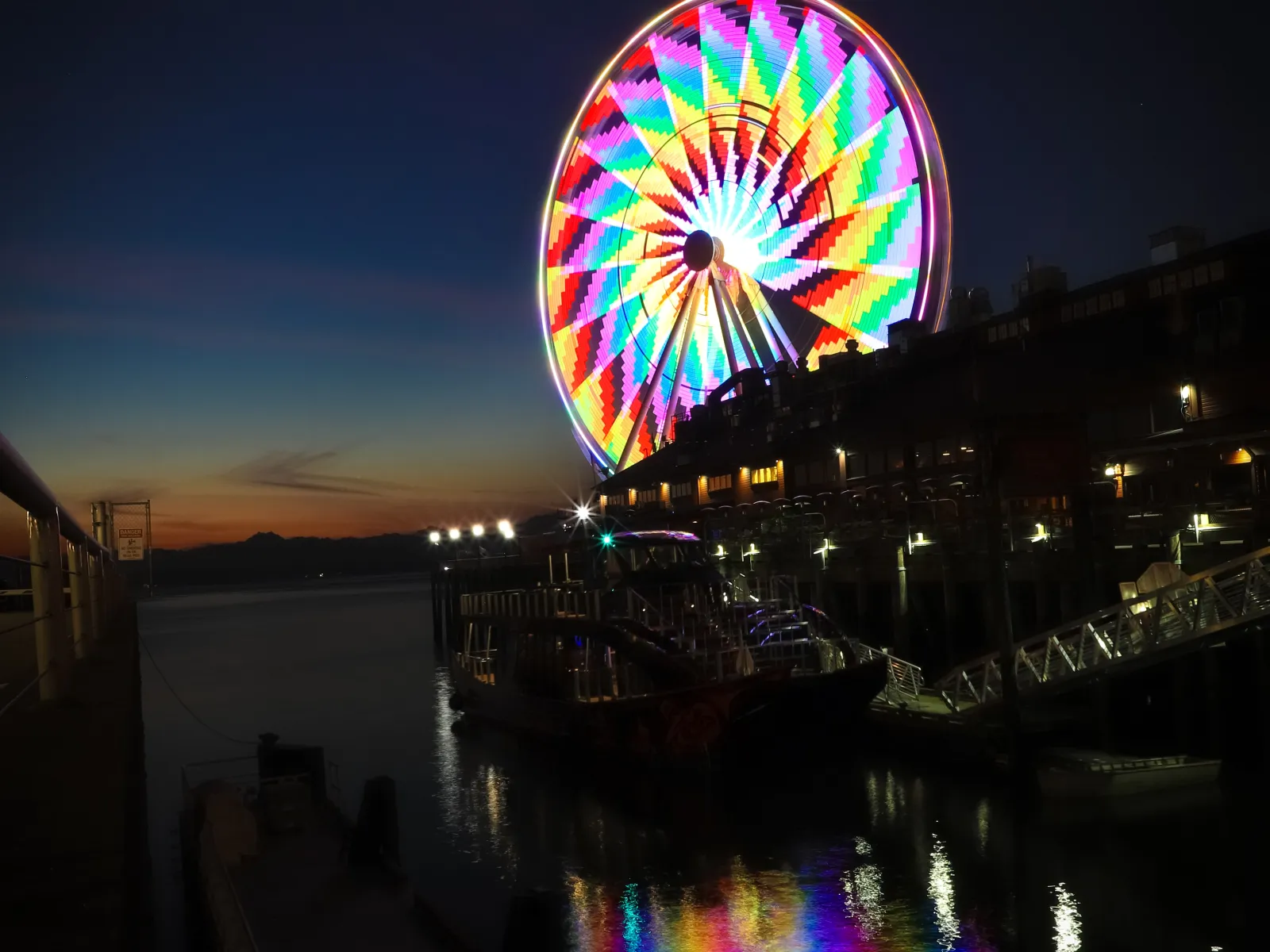 a ferris wheel lit up at night