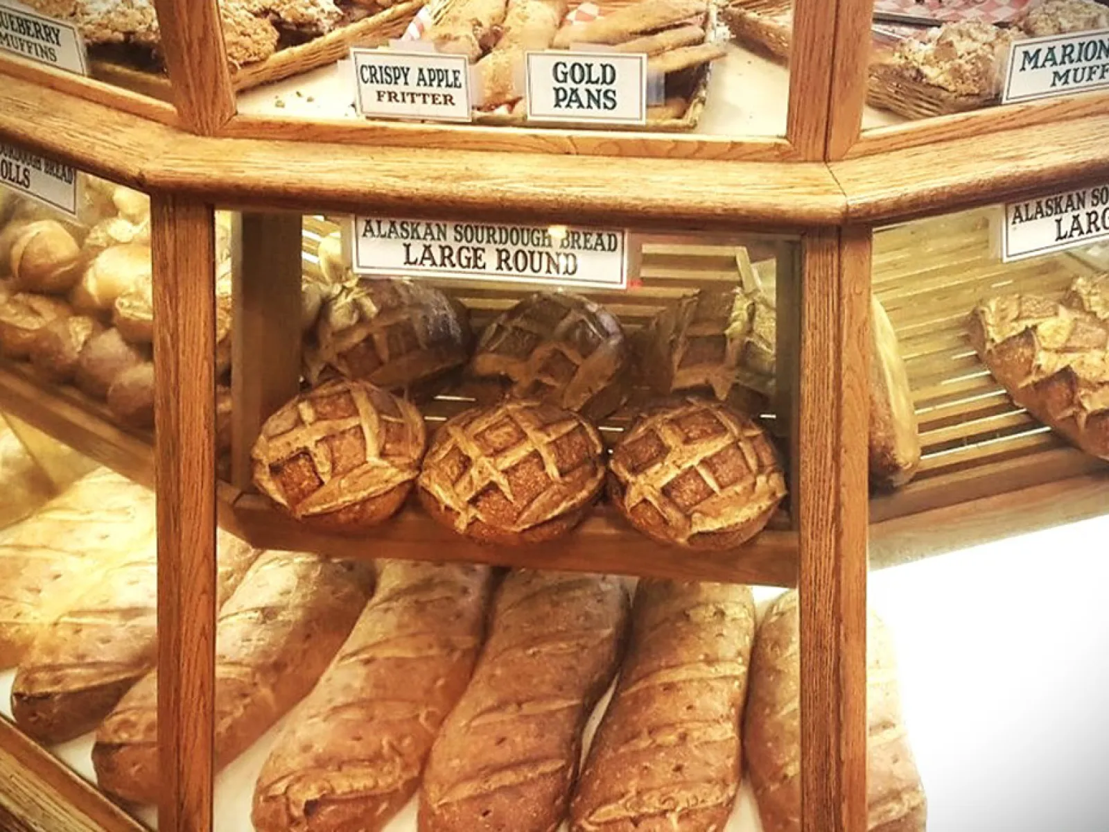 a bakery display with pastries