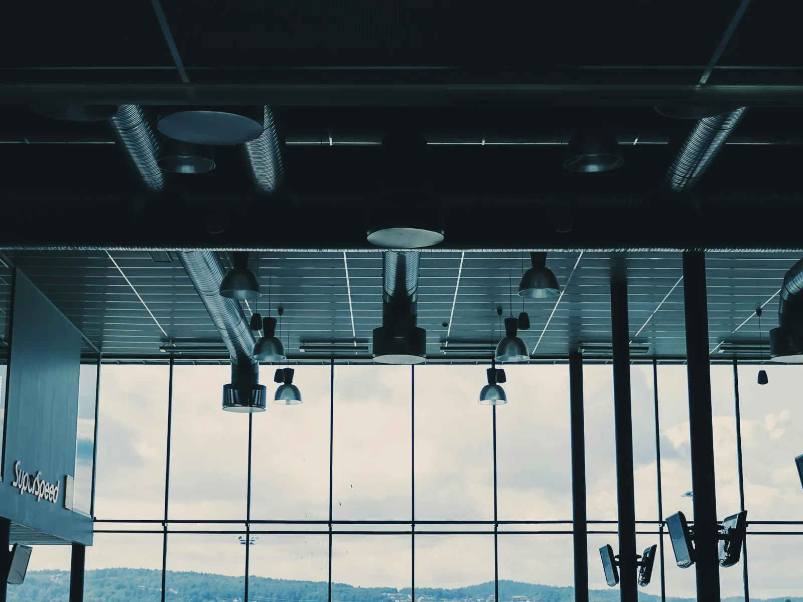a group of lights from a ceiling