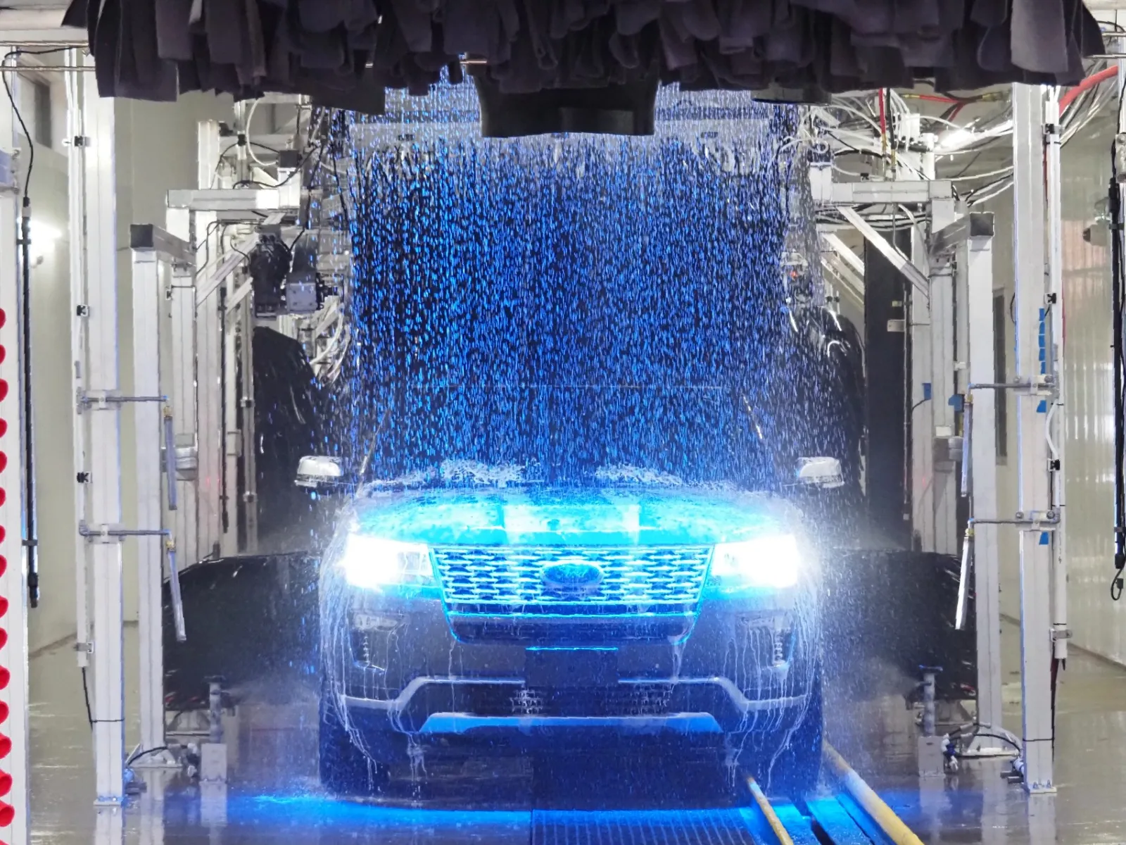 a large blue tank in a factory