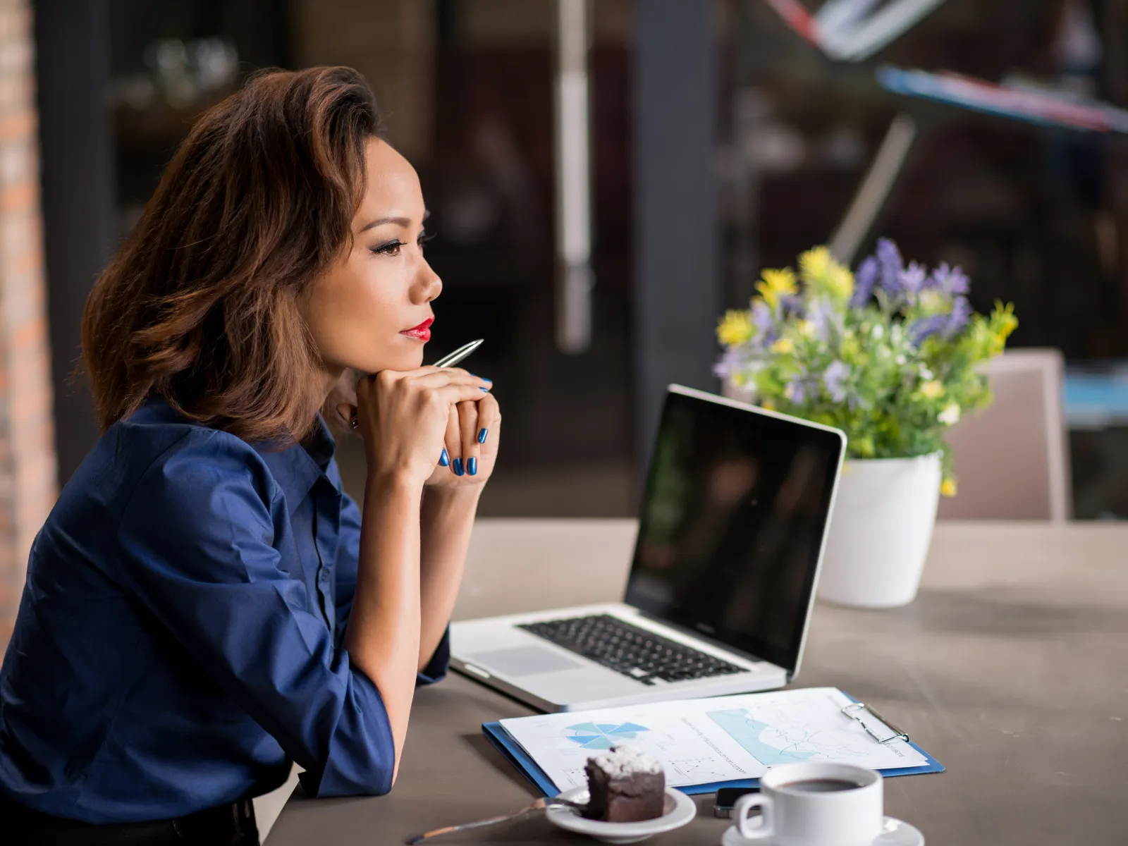 Woman thinking about how much a name change costs