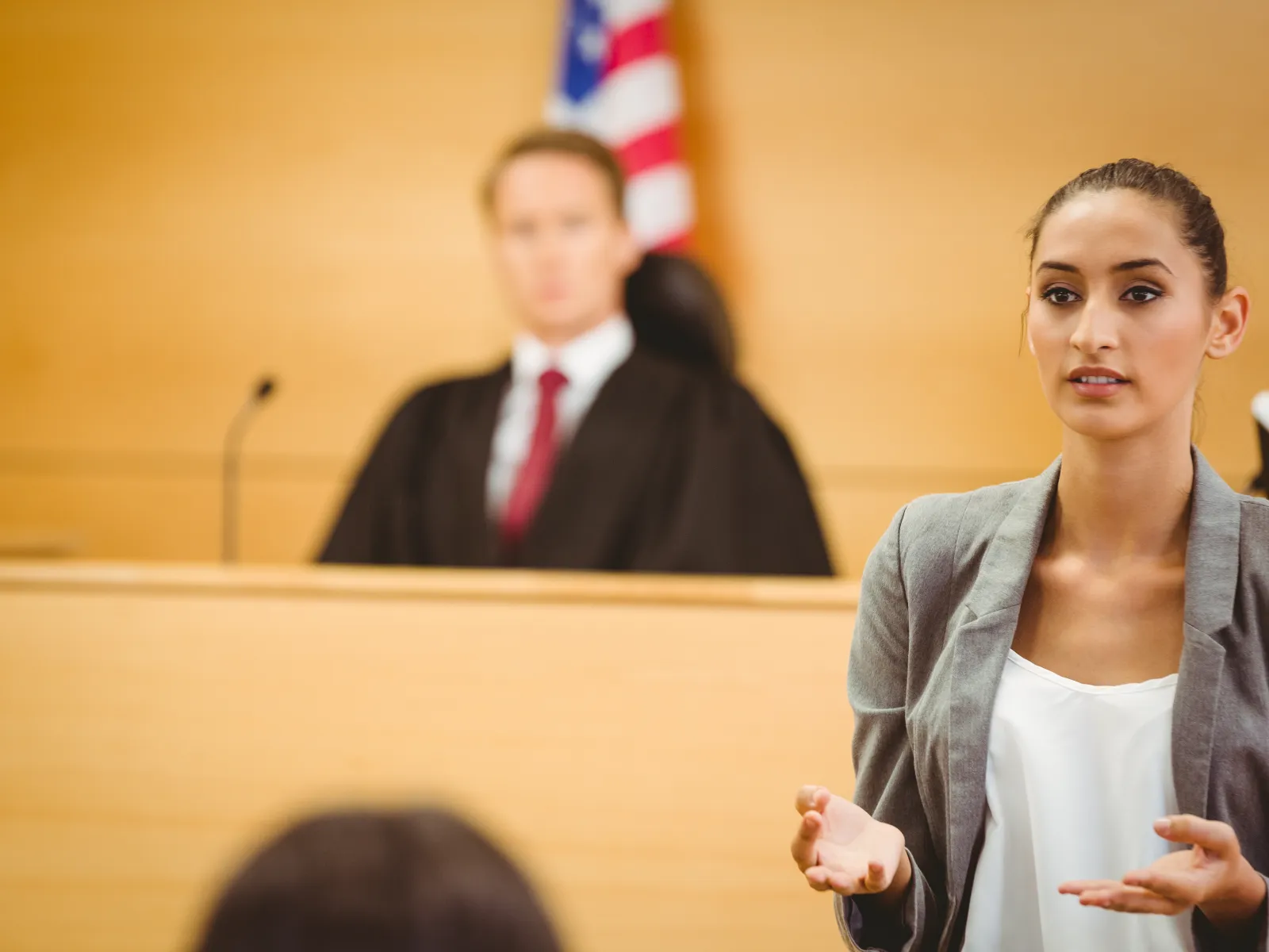 Making an opening statement in divorce trial.