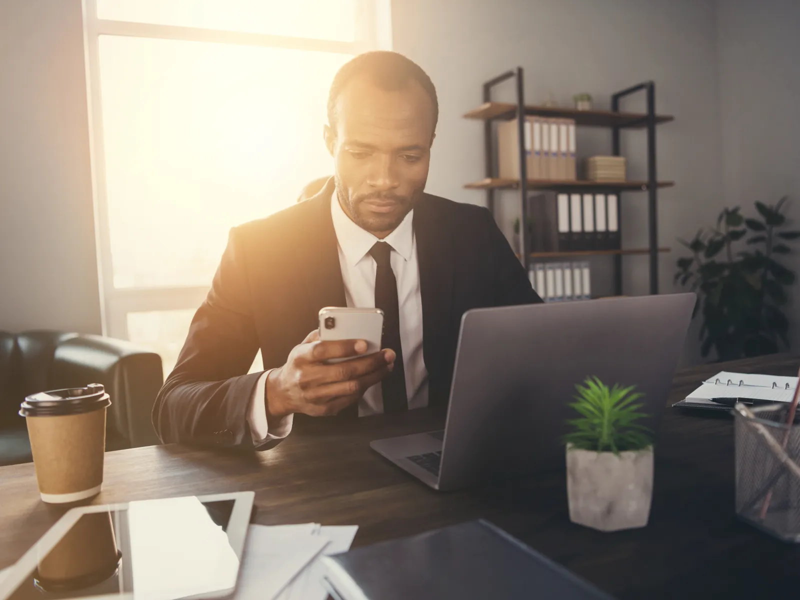 A divorce lawyer on a phone intake with a client.