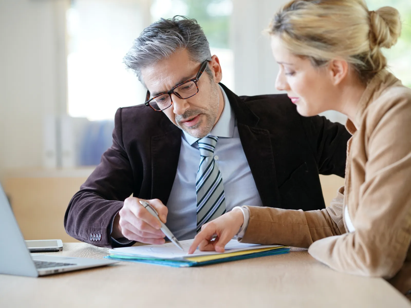 Interviewing a divorce lawyer before hiring them.