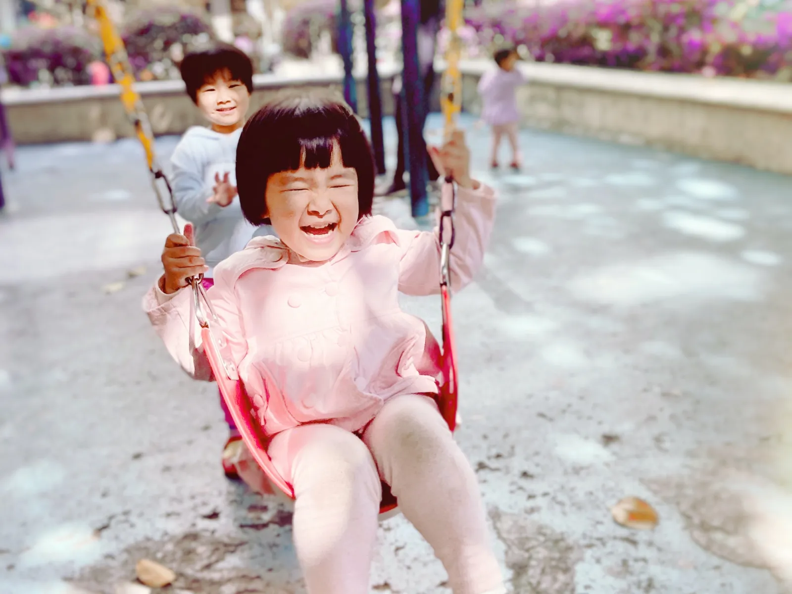a little girl walking down the street