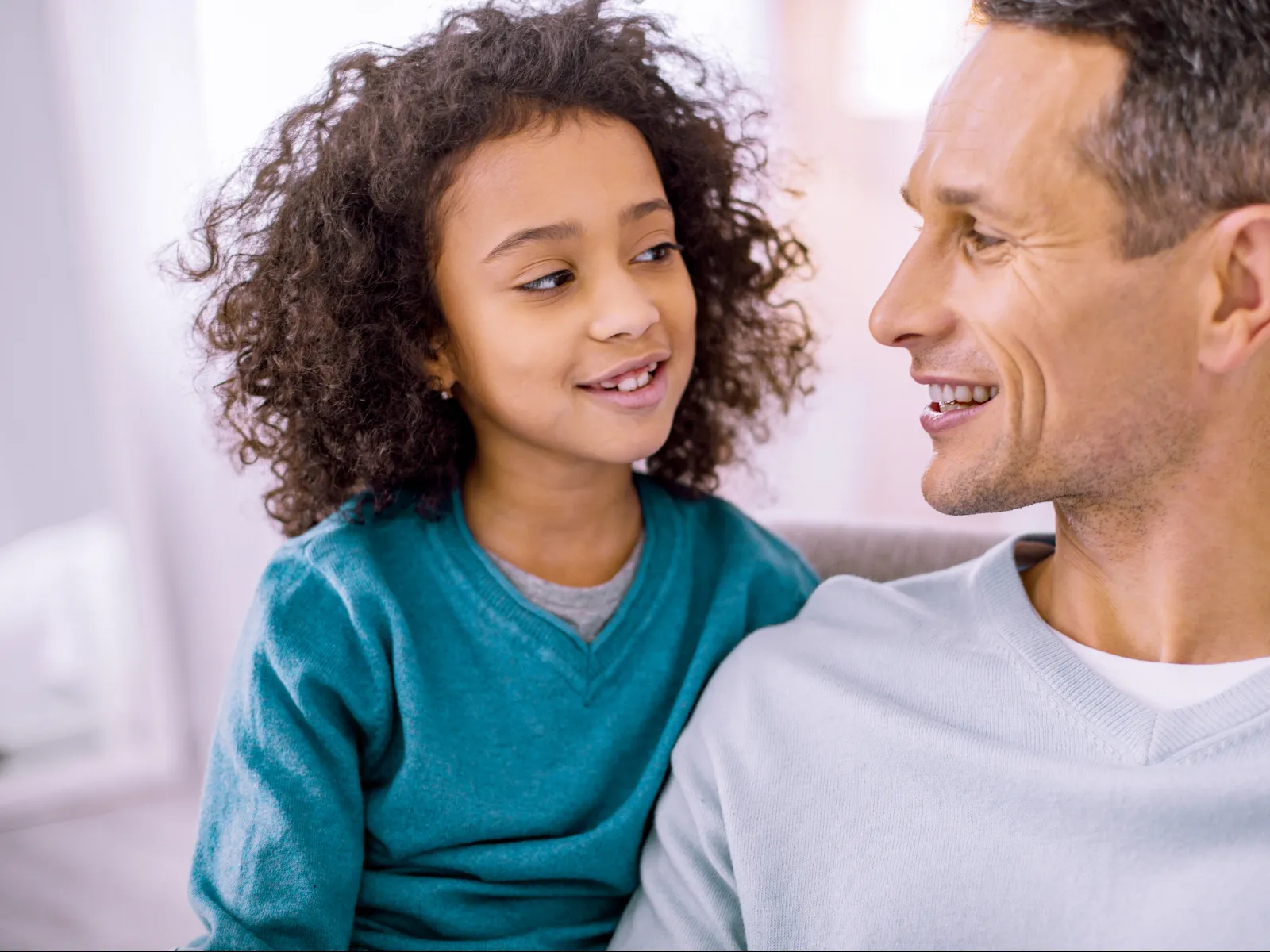 A father with his daughter during their visitation and custody time.