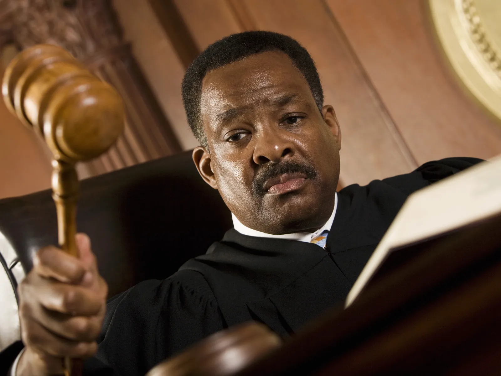 Judge determining child custody modification