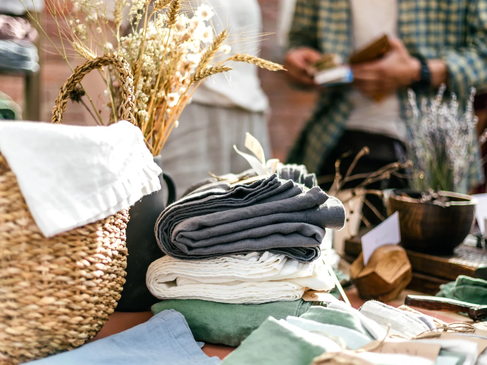 a person paying for yard sale items