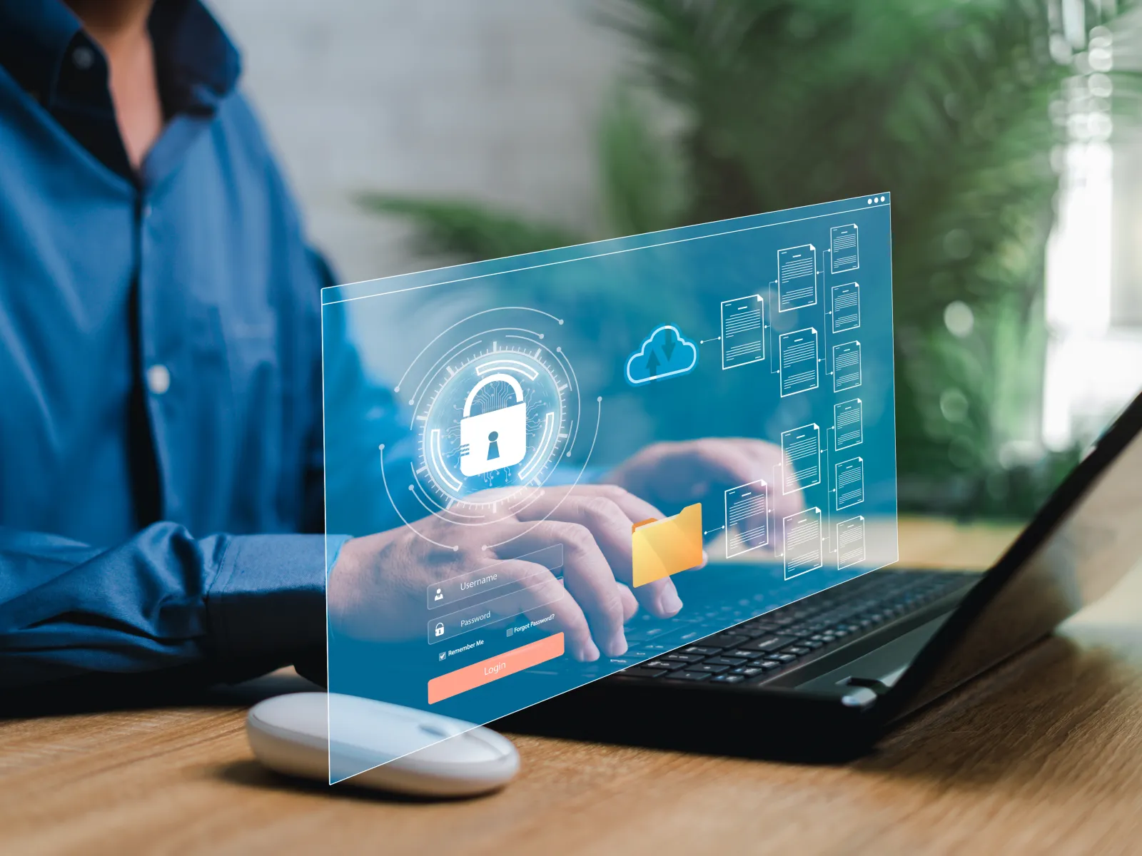 Person using laptop with digital security interface showing locked padlock and cloud data icons