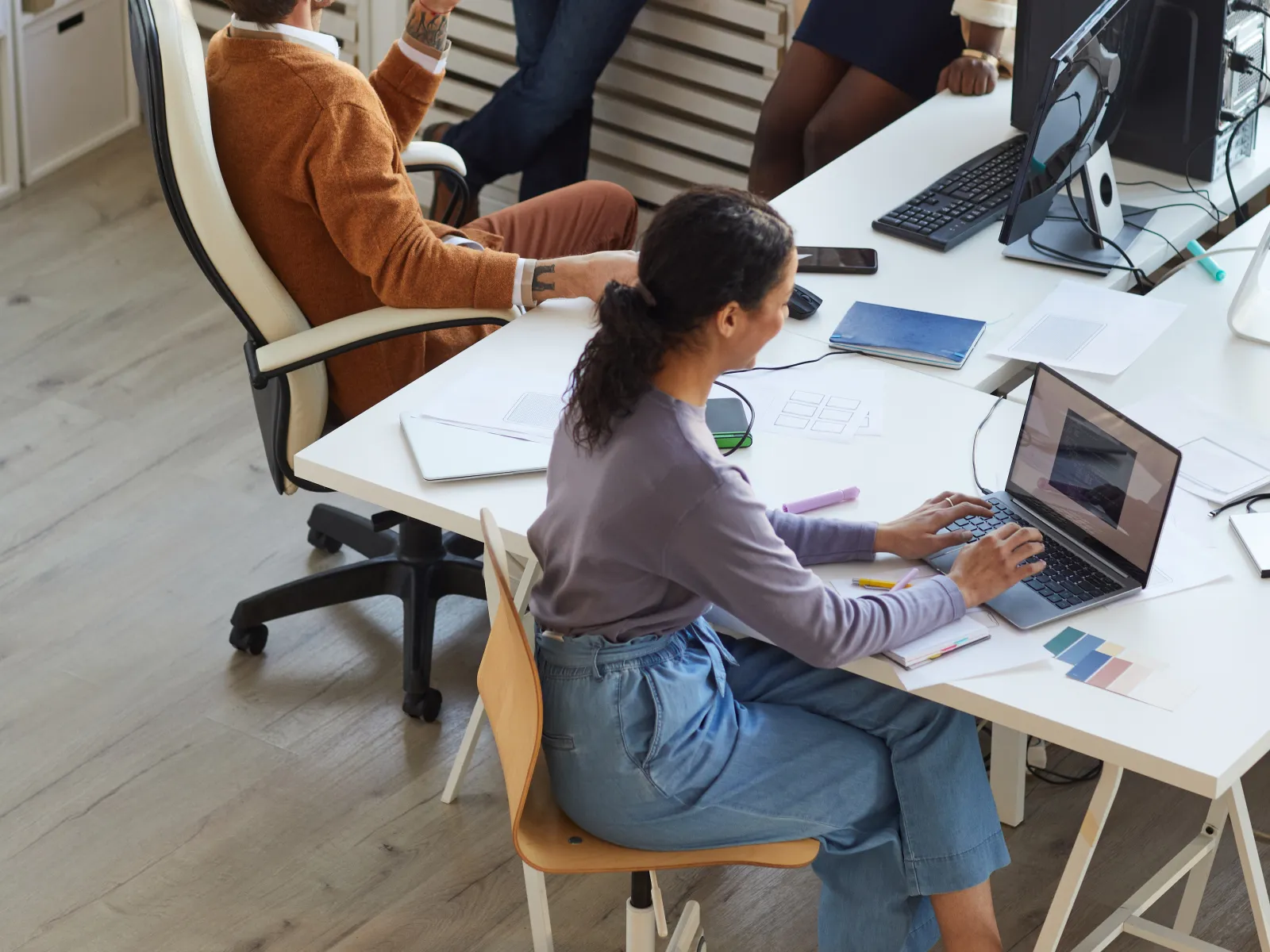 a group of people in an office