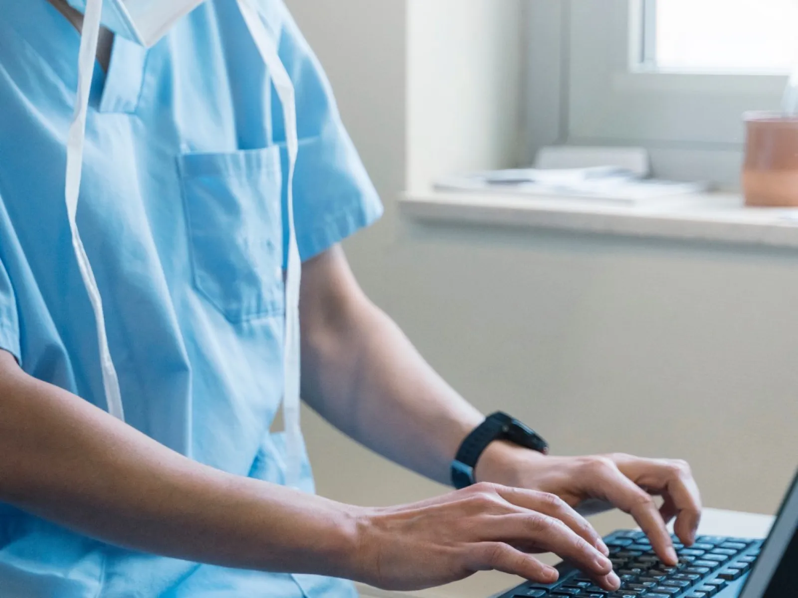 a doctor using a computer