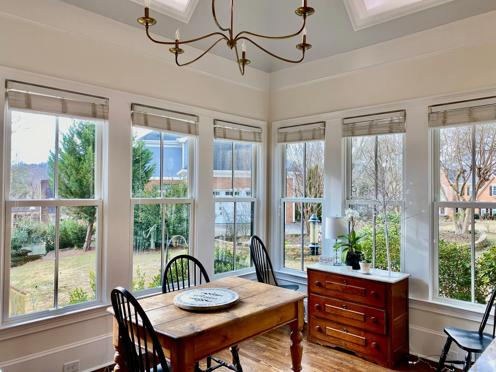 a dining room with large windows