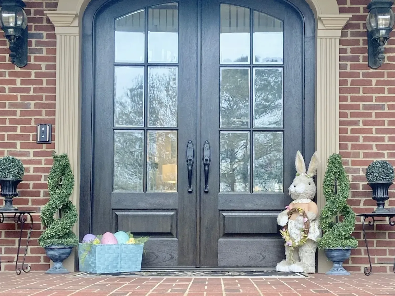 a statue in front of a door