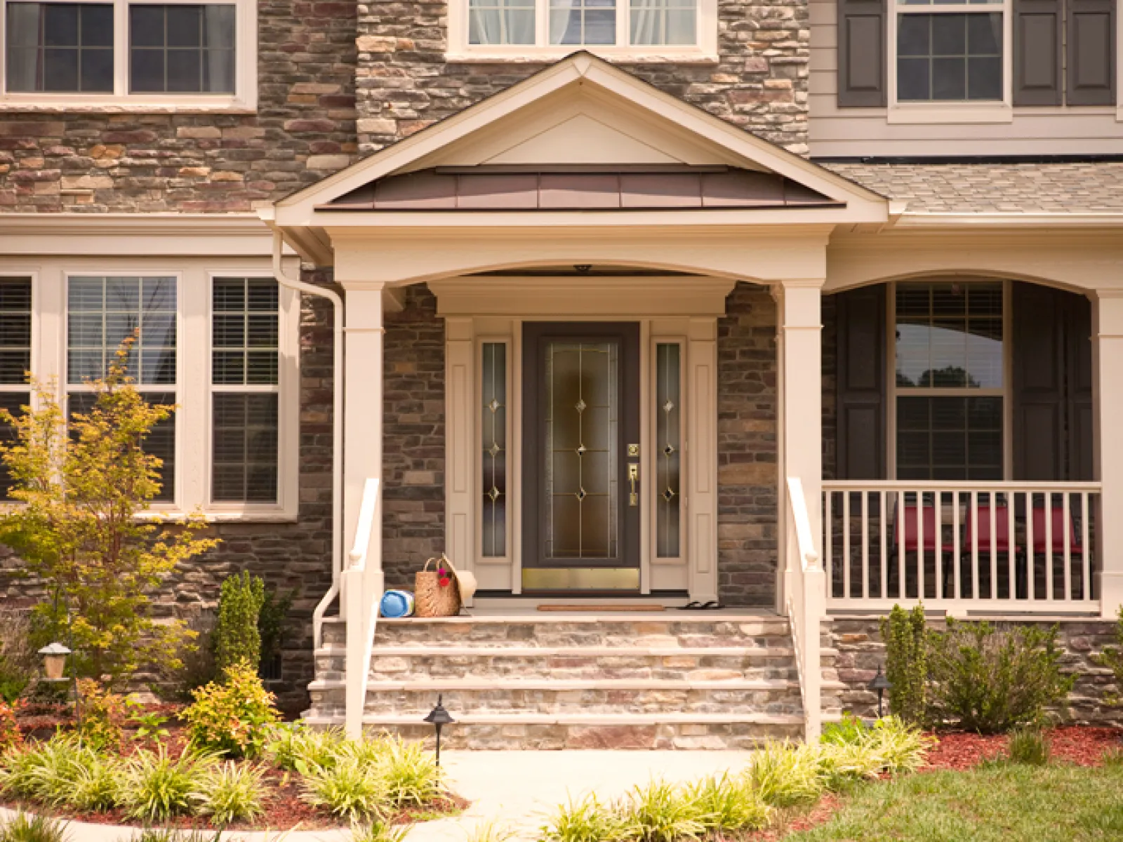 a house with a porch and a small patio