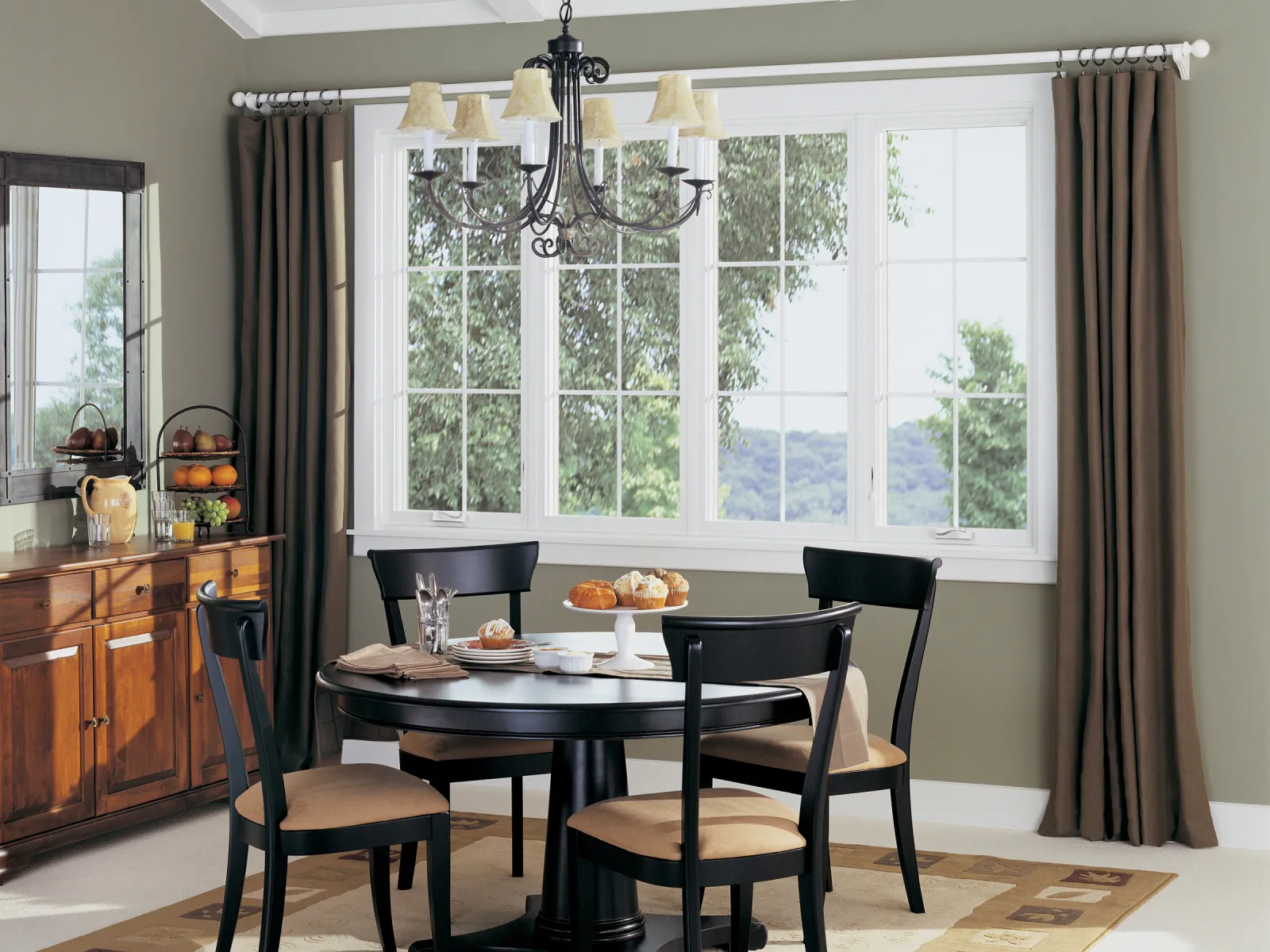 a dining room table with chairs around it