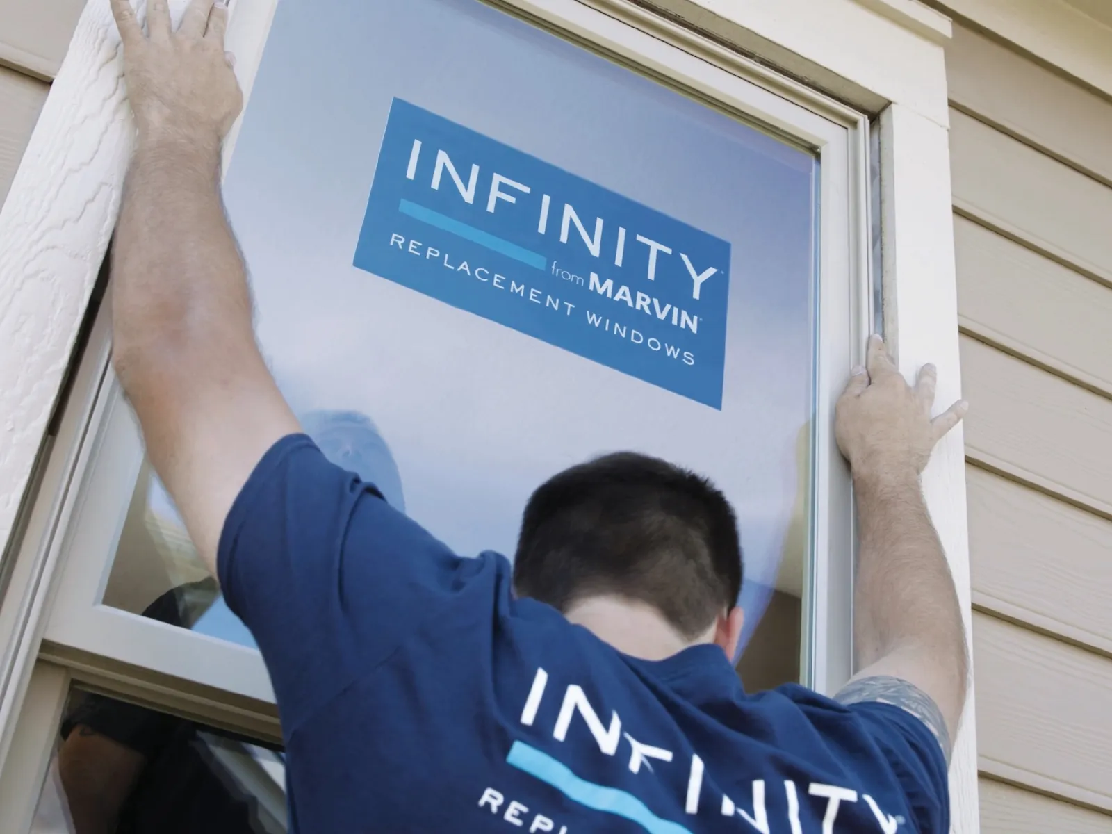 a man holding a sign