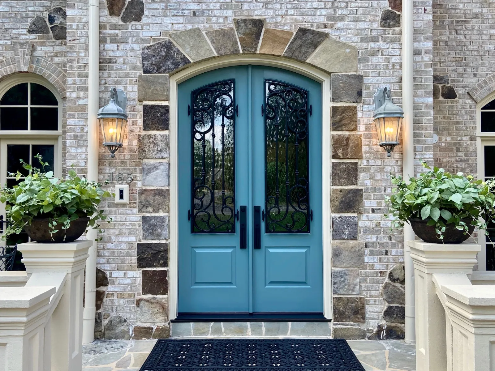 a blue door on a stone building