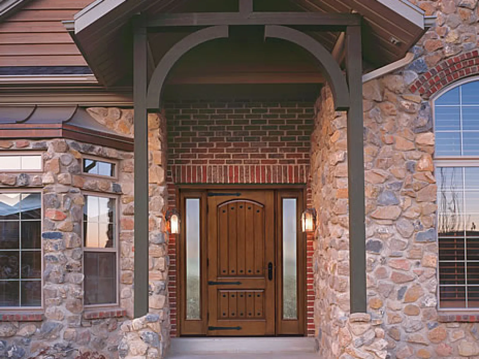 a stone building with a large arched doorway