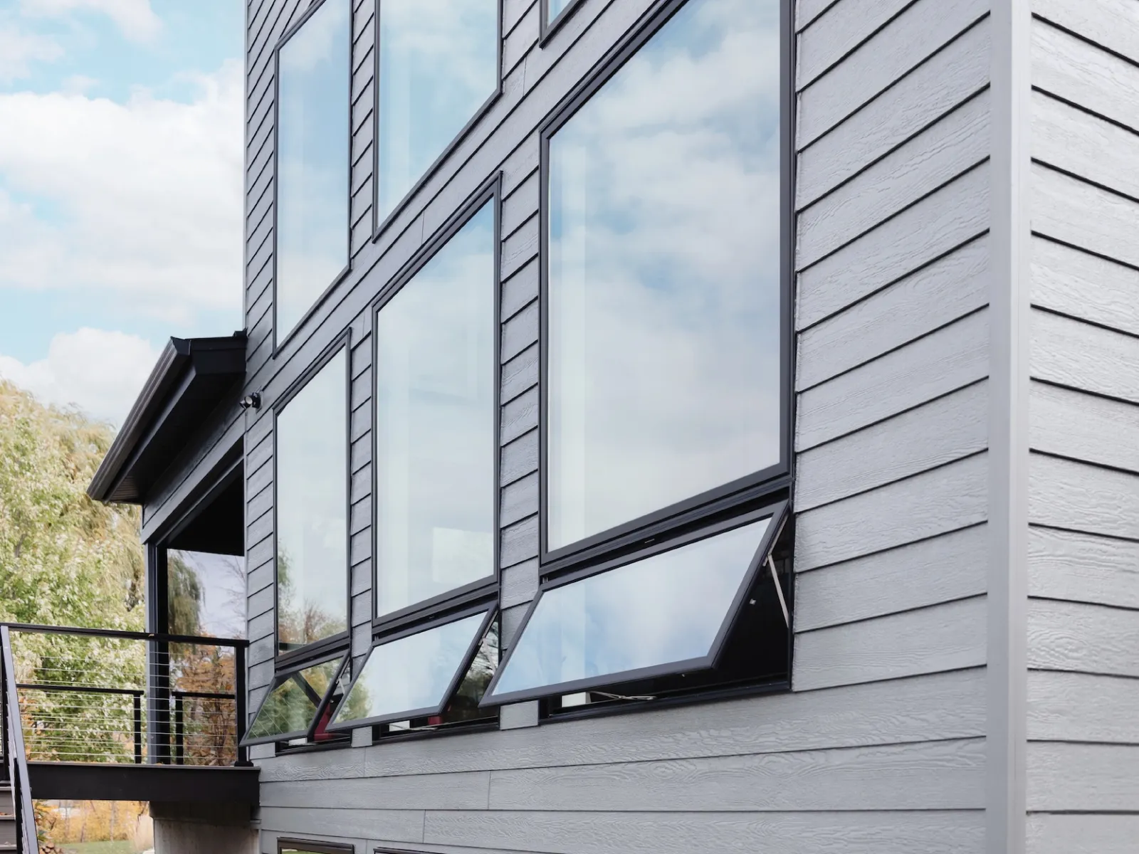 Black fiberglass awning windows installed by North Georgia Replacement Windows
