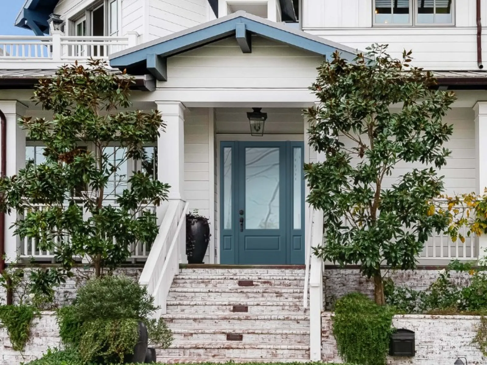 a house with a blue door from Plastpro door manufacturer