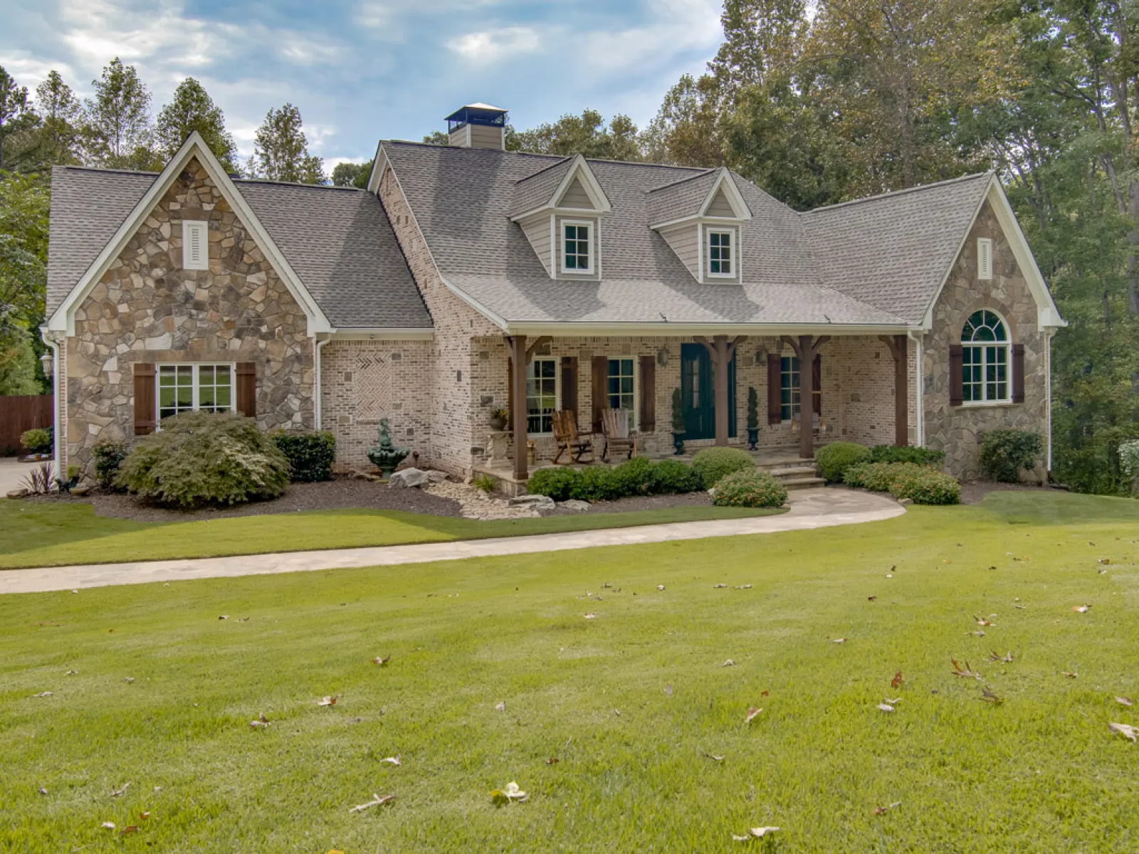 a large house with a lawn