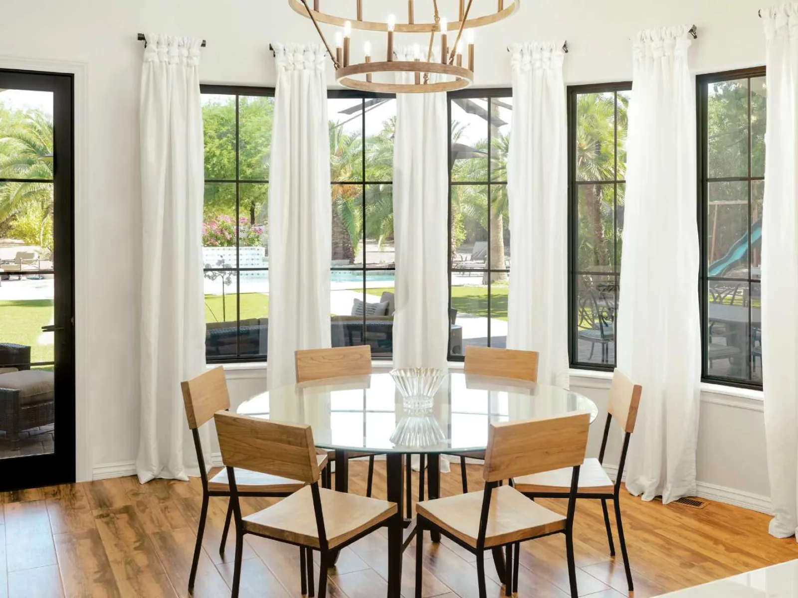 a dining room table with chairs around it
