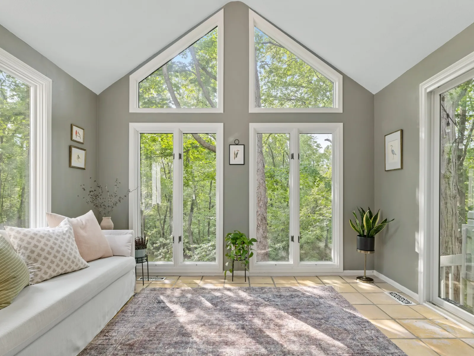 a living room with a large glass door