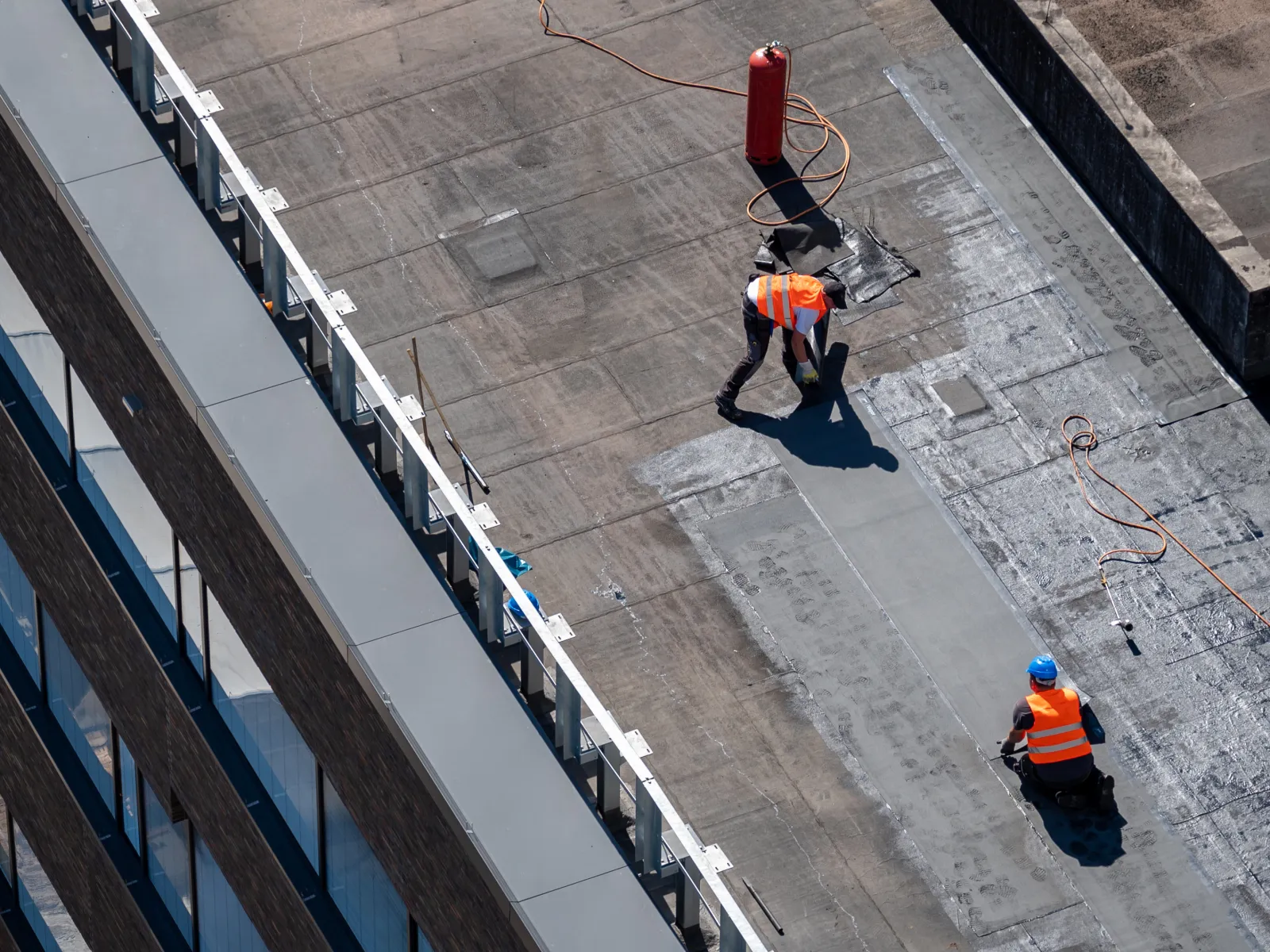 a few men working on a construction site