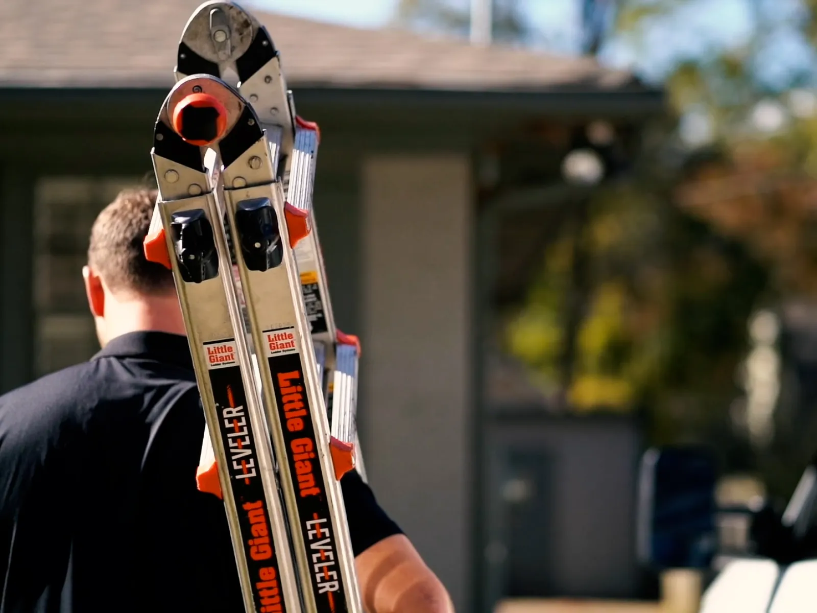 a man holding a snowboard