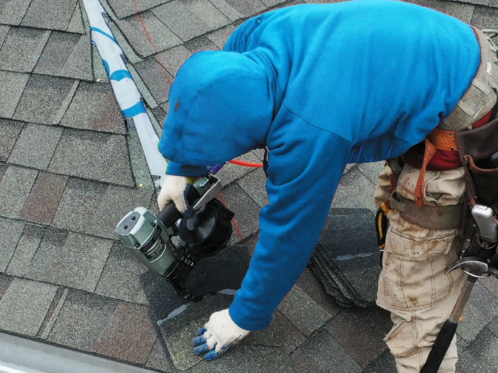 roofing contractor installing roofing tiles in south windsor ct