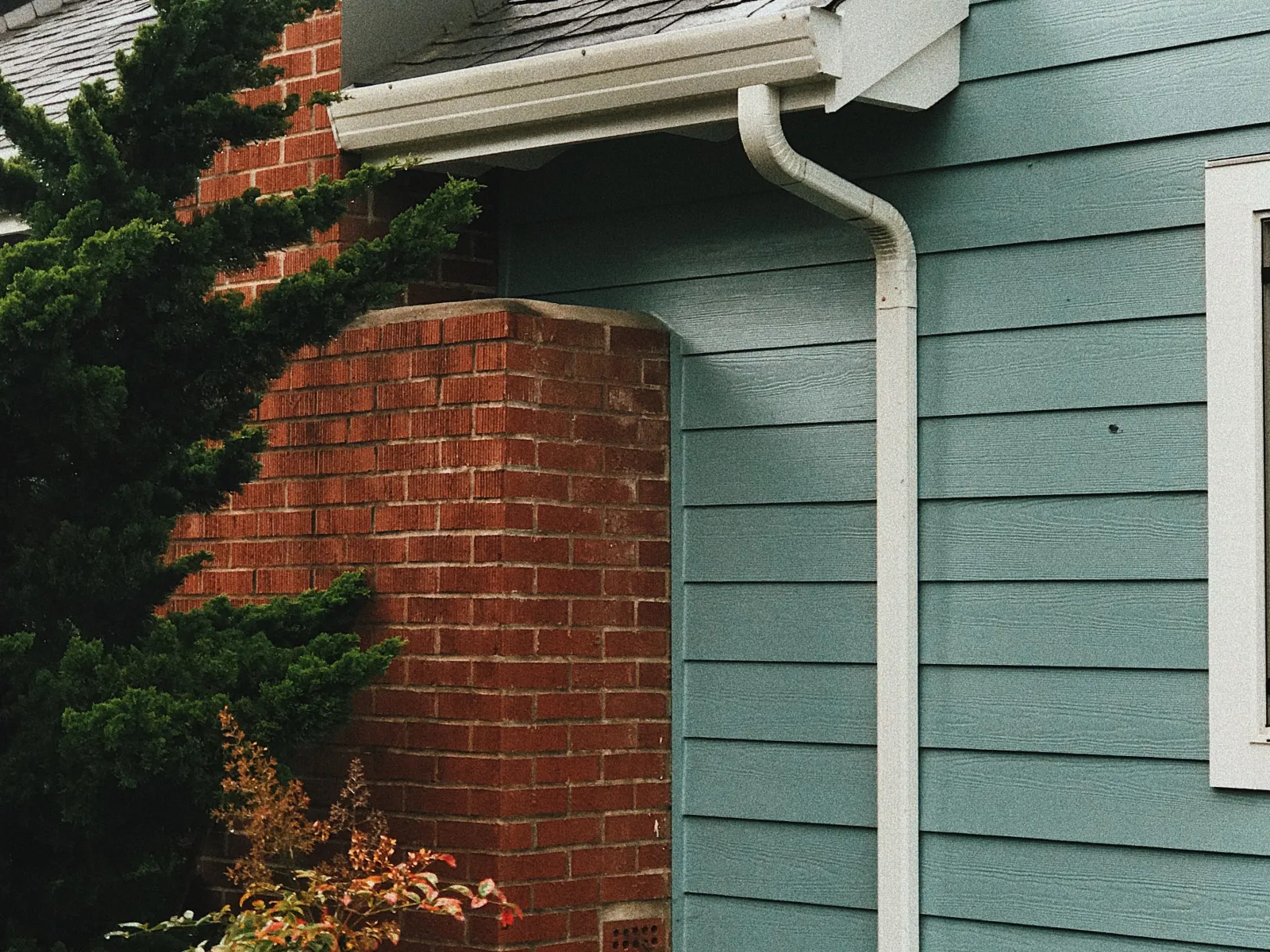 a house with white gutters