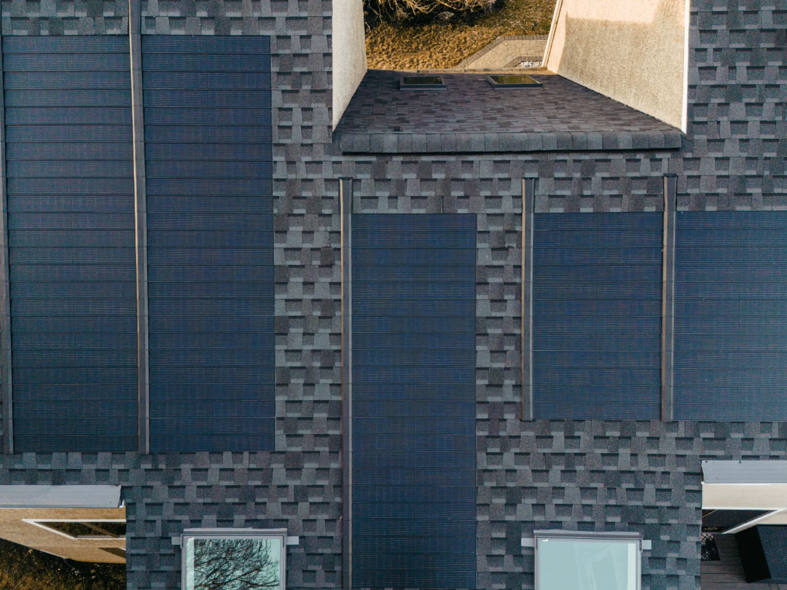solar shingles installed on a residential roof