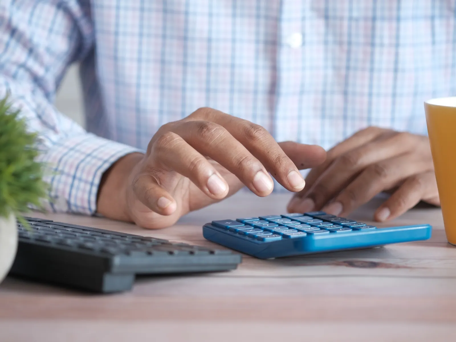 a person using a calculator