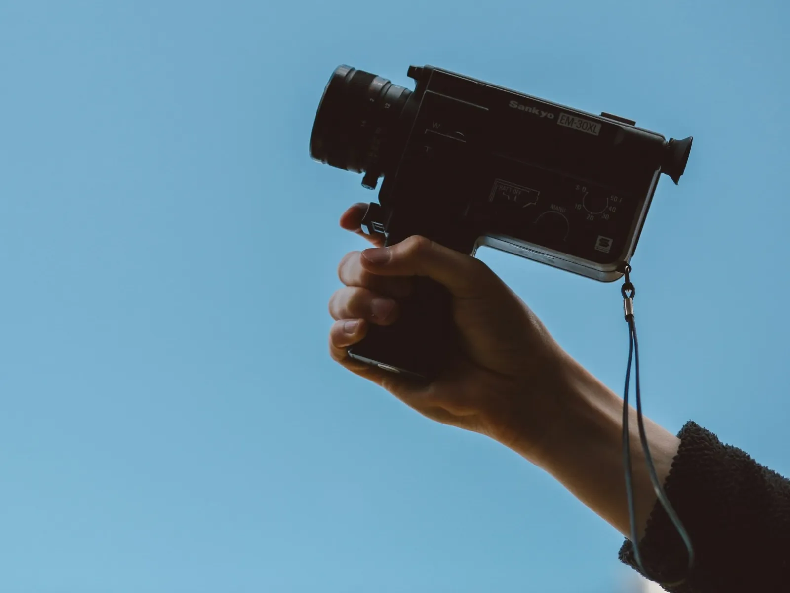 a person holding a camera
