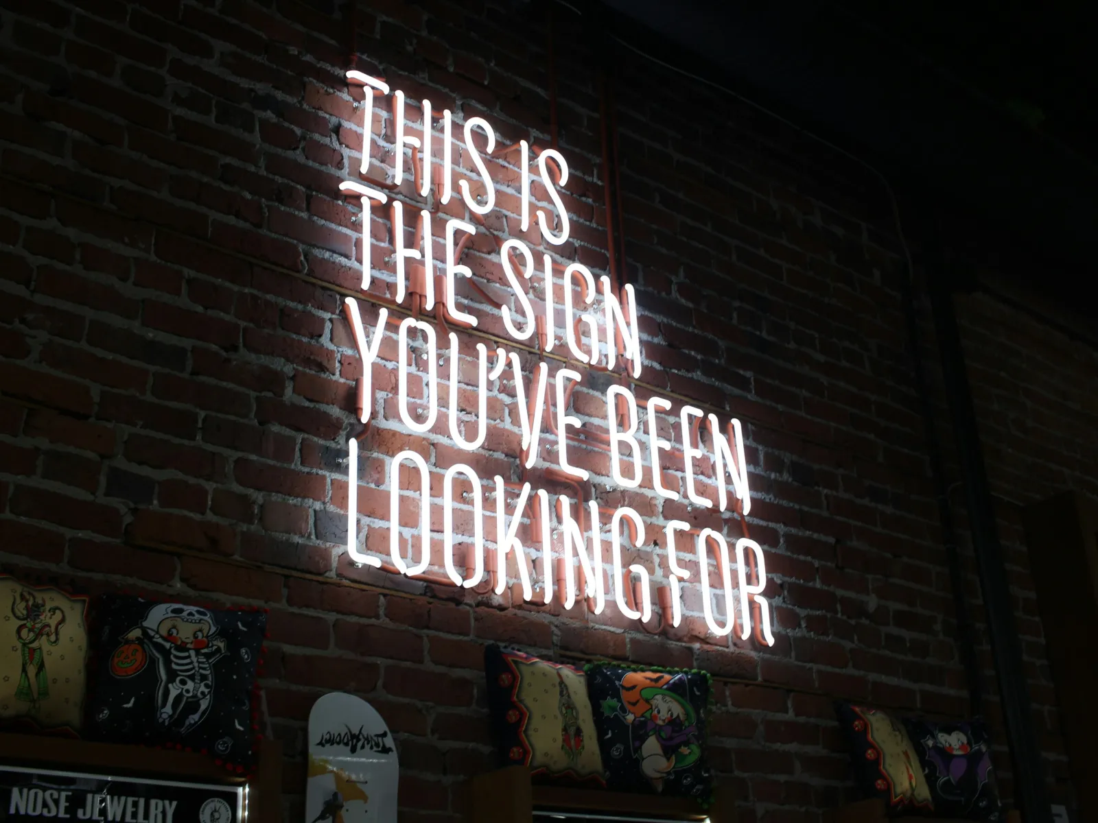 a sign on a brick building
