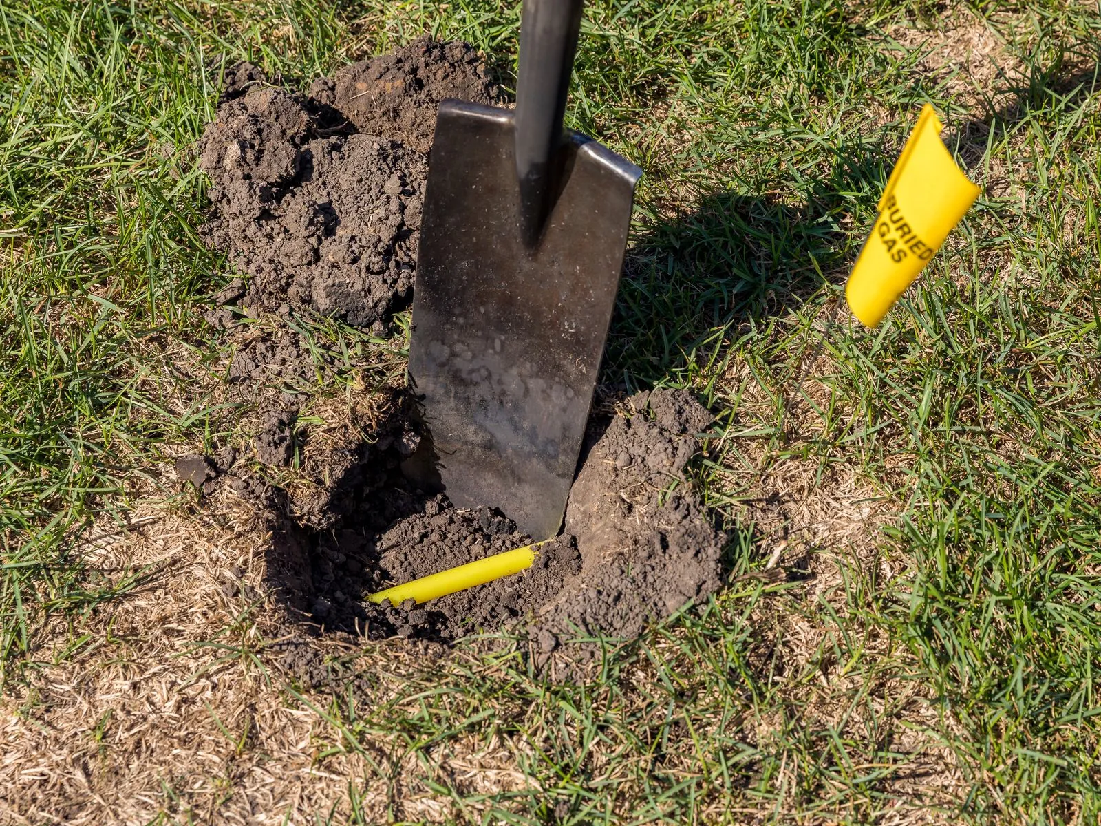 a shovel and a shovel in the dirt