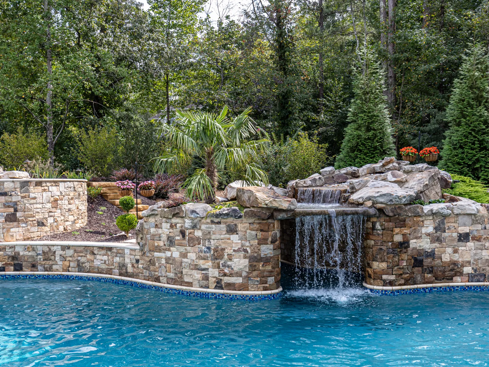 a waterfall into a pool