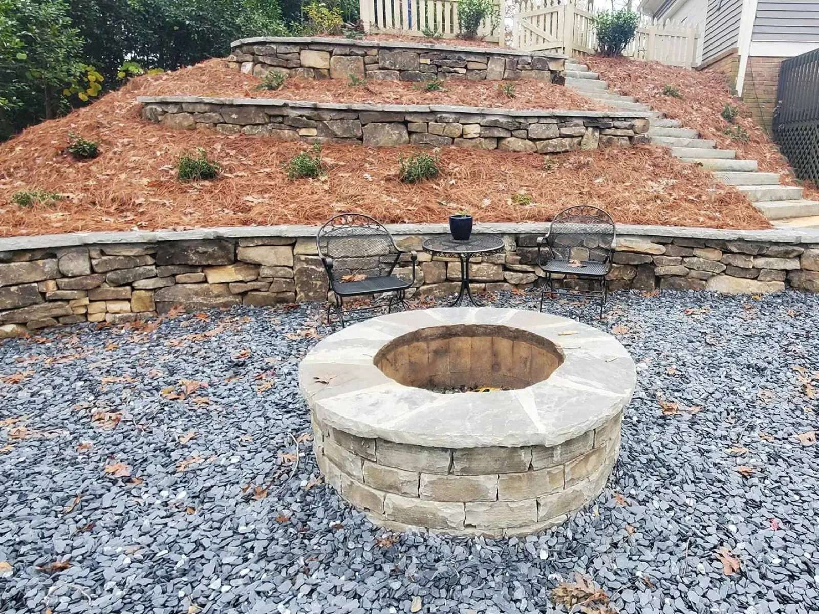 a round fountain in a courtyard