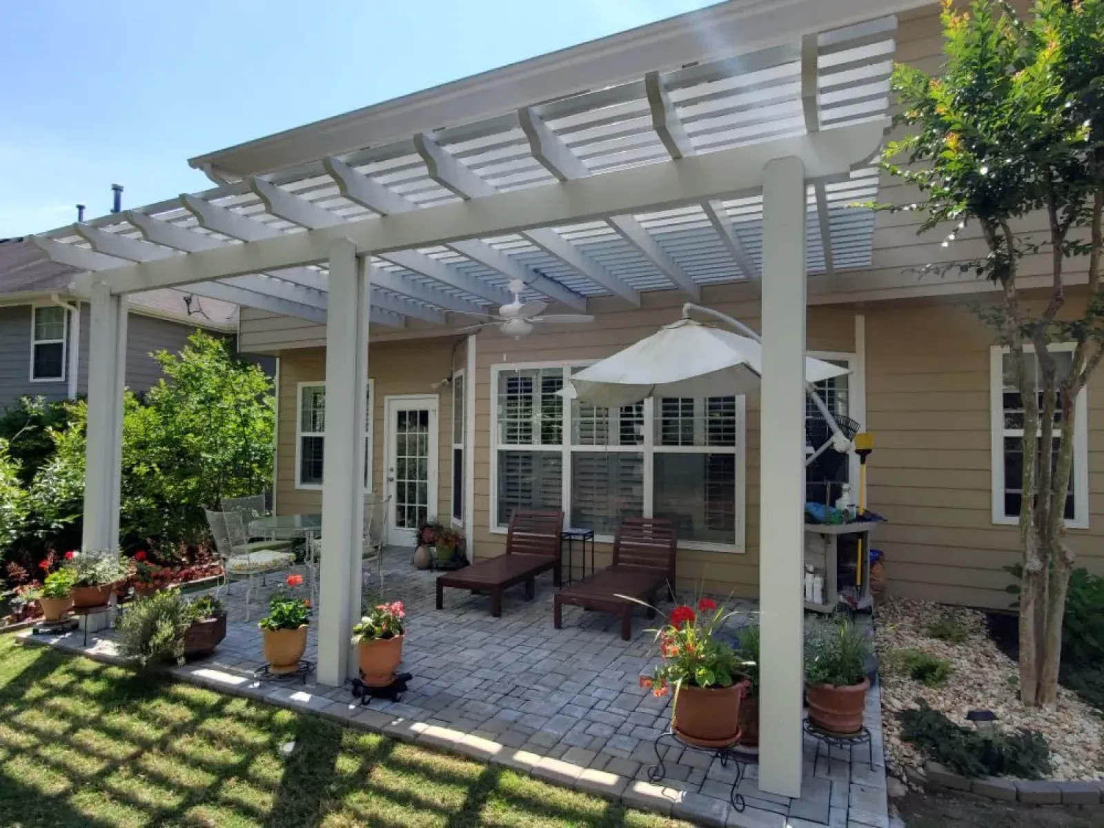 a patio with a covered patio