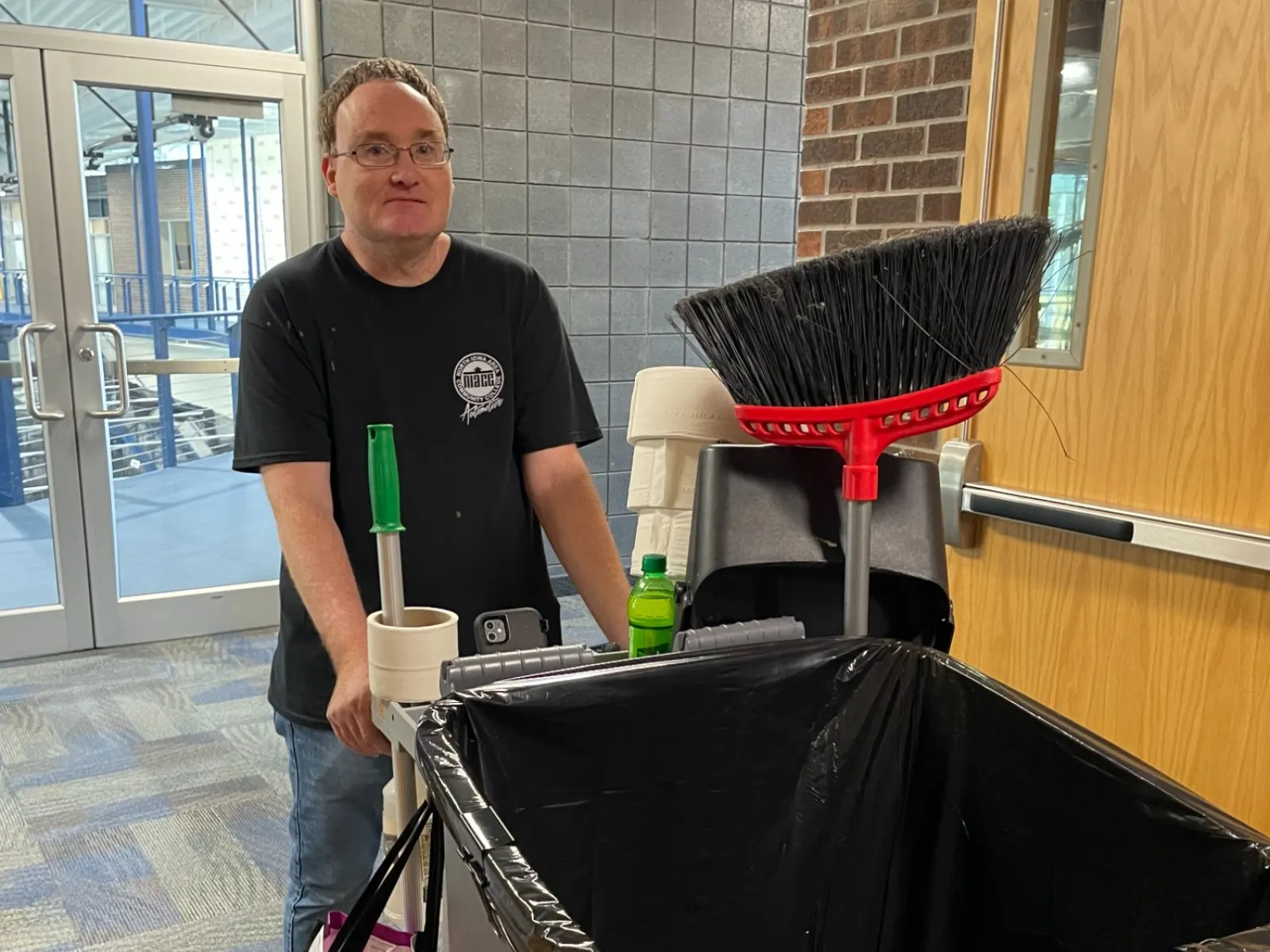 a person standing next to a table