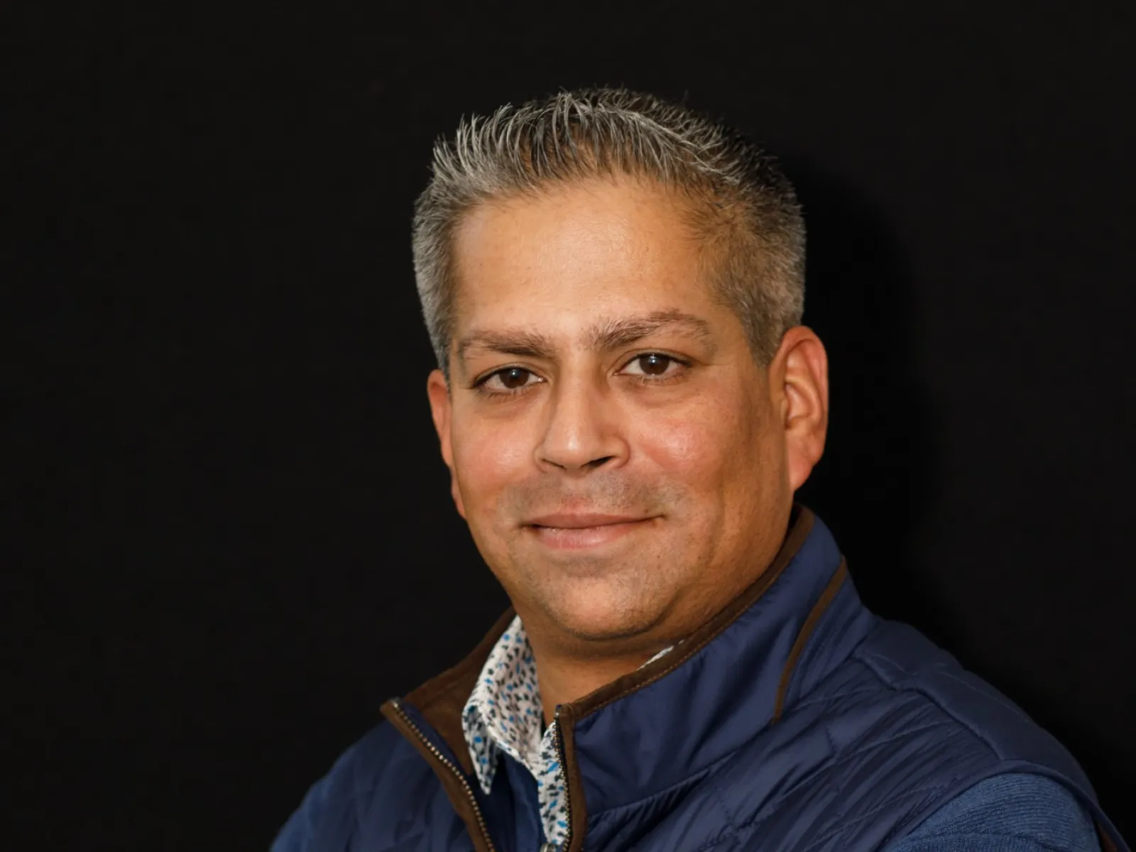 a man in a blue shirt