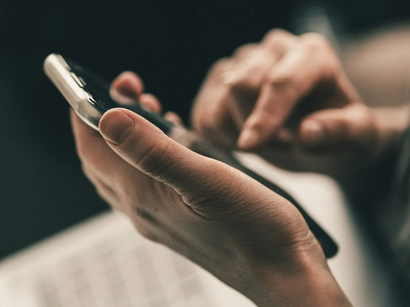a person holding a cell phone