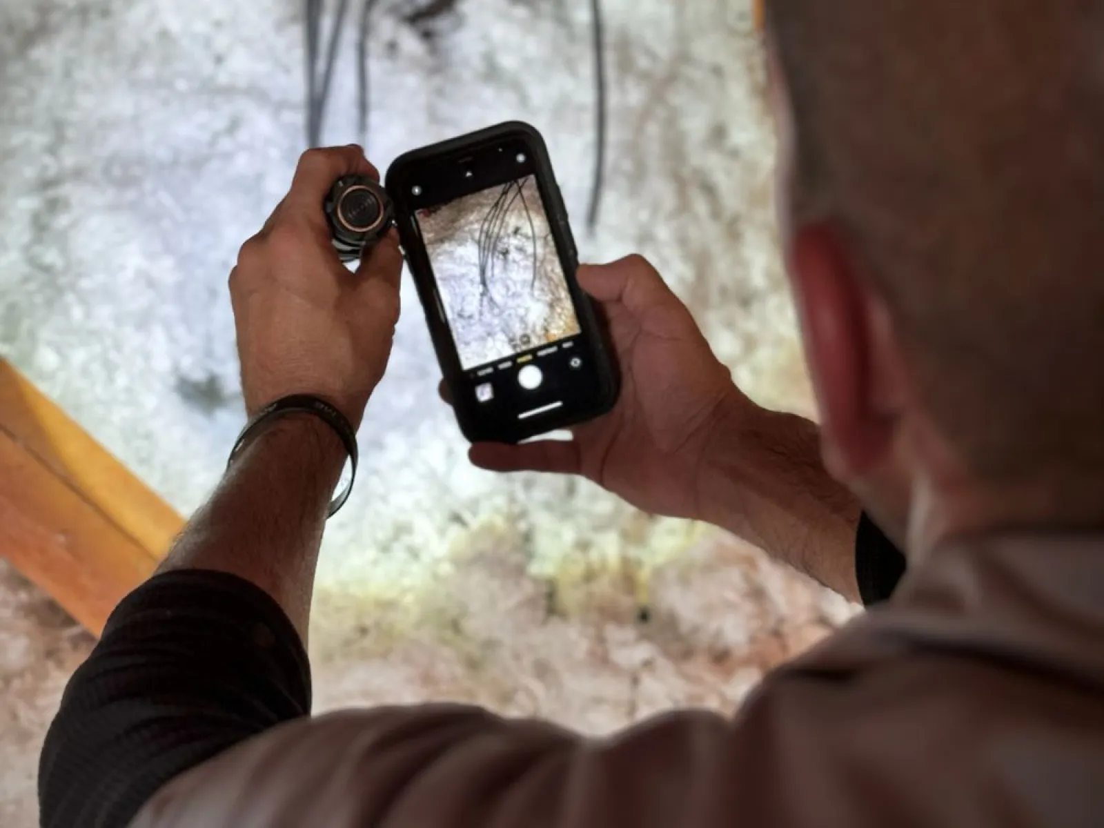 a man holding a camera