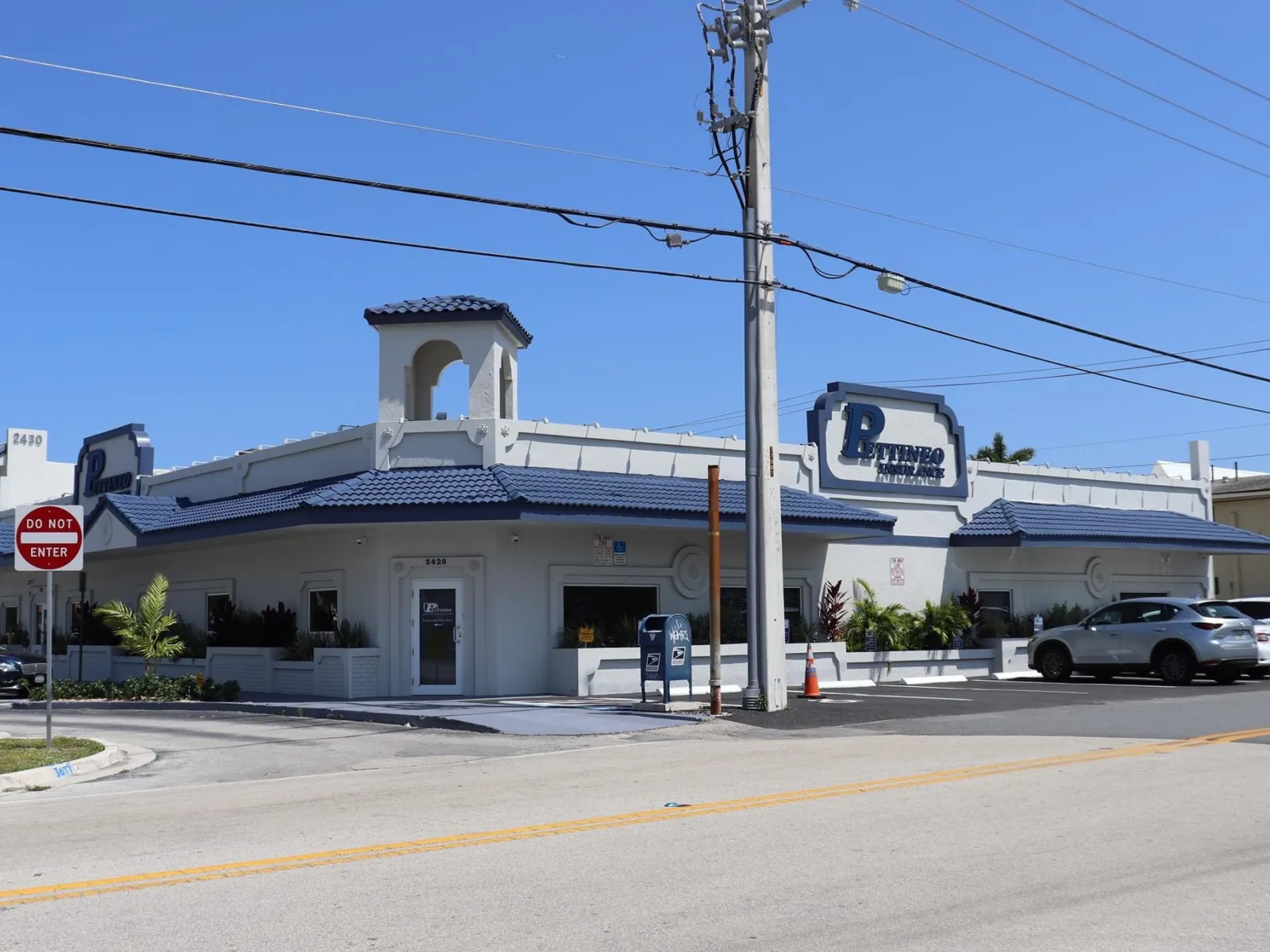 a white building with a sign